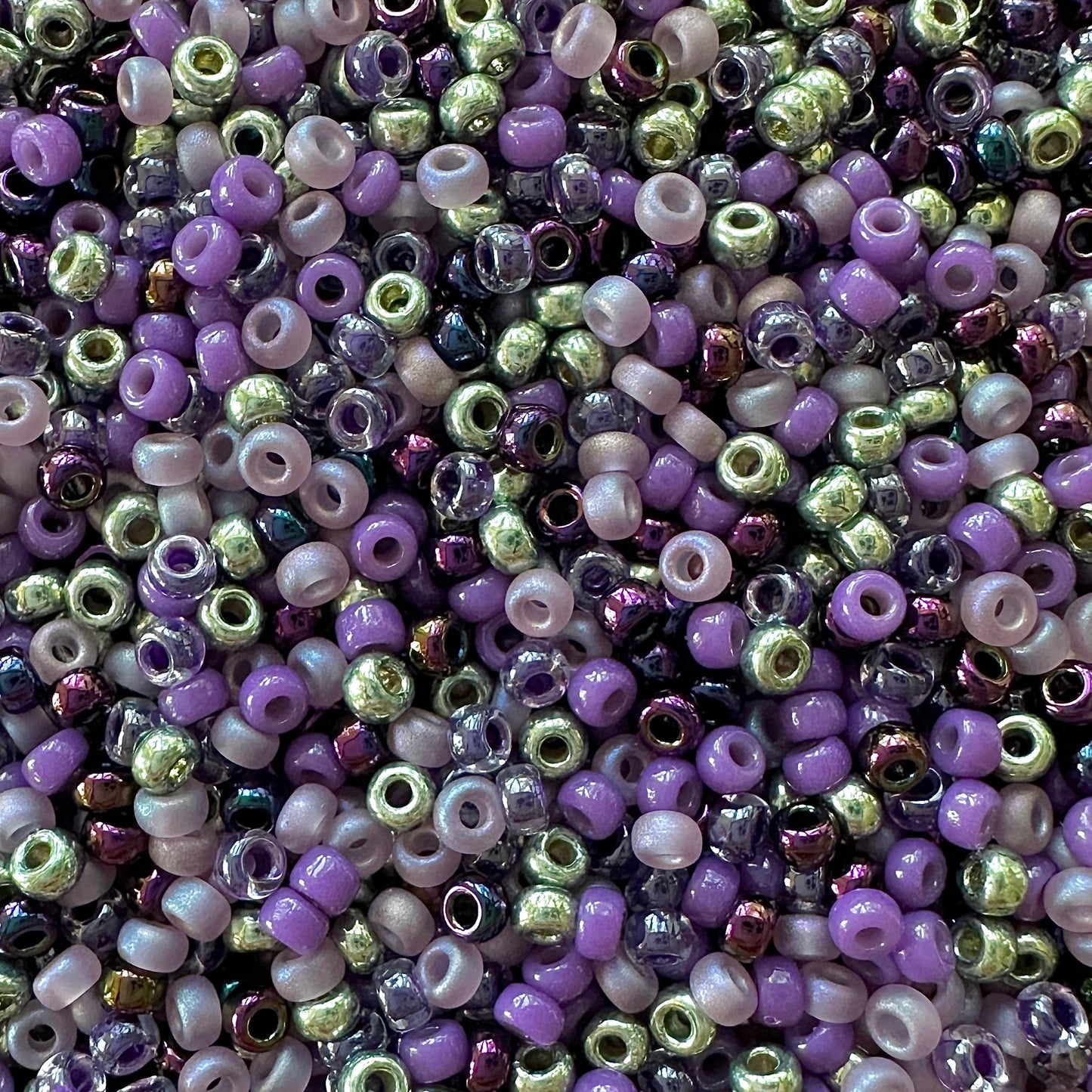 Mix of green and purple Miyuki 11/0 seed beads created by The Bead Mix