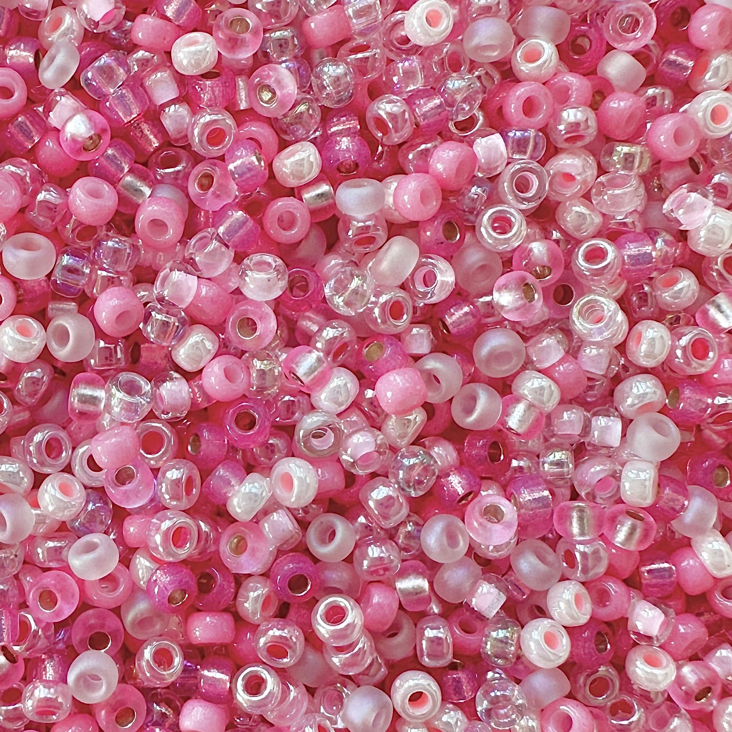 Mix of pink miyuki 11/0 seed beads by The Bead Mix