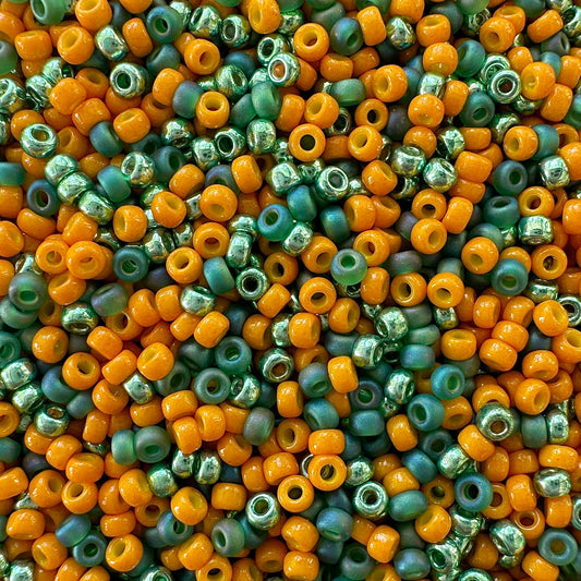 A mix of orange and green Miyuki 11/0 seed beads mixes created by The Bead Mix