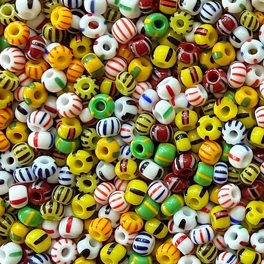 Mix of striped Czech 6/0 seed beads in yellow, green, black, white, red, and blue.