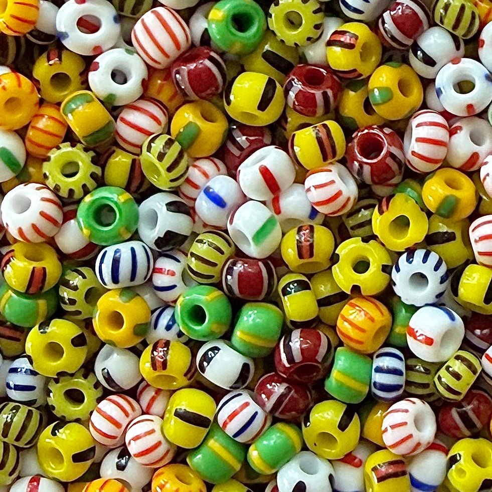 Mix of striped Czech 6/0 seed beads in yellow, green, black, white, red, and blue.