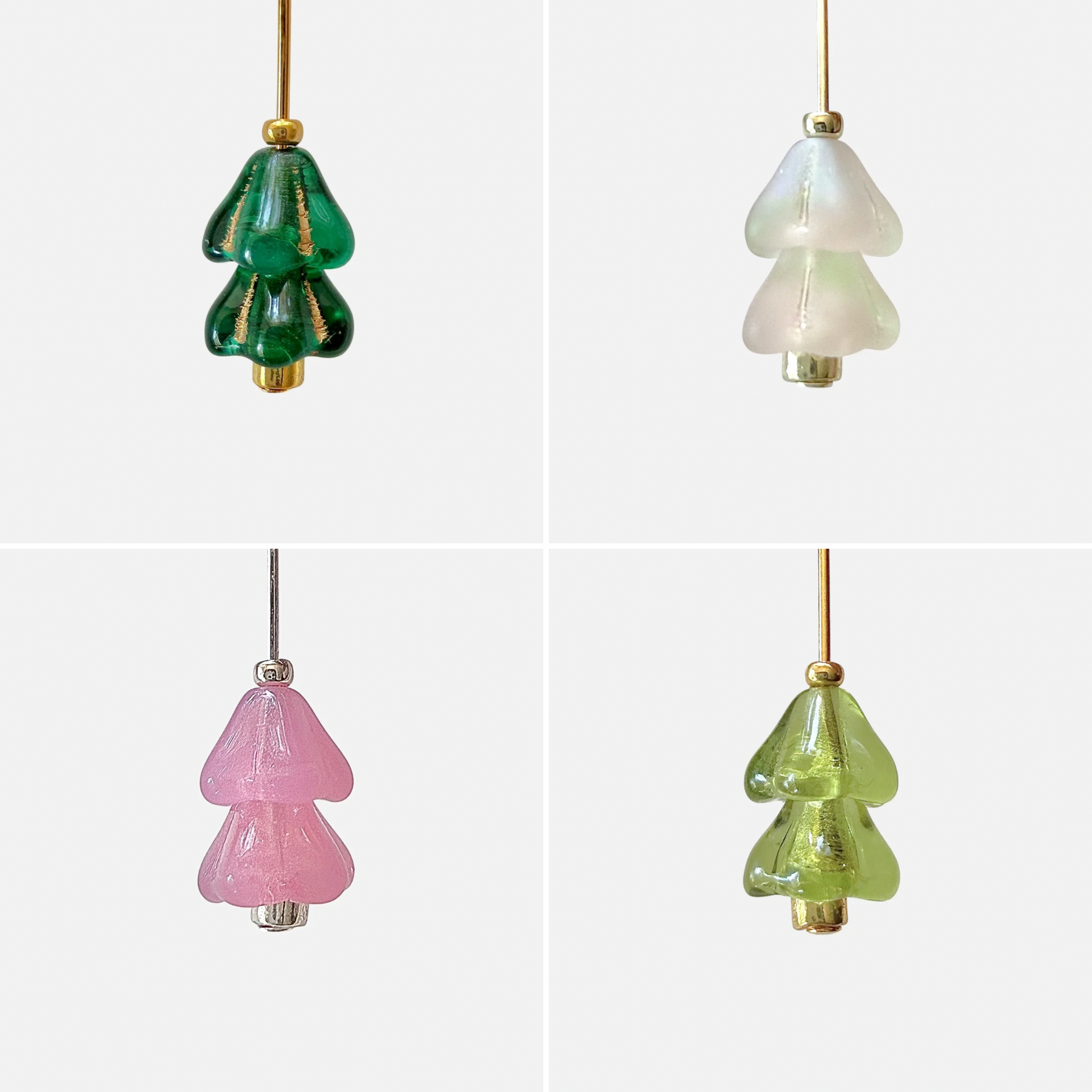 Four hanging beaded Christmas tree charms in green, white, and pink arranged in a 2x2 grid on a light gray background.