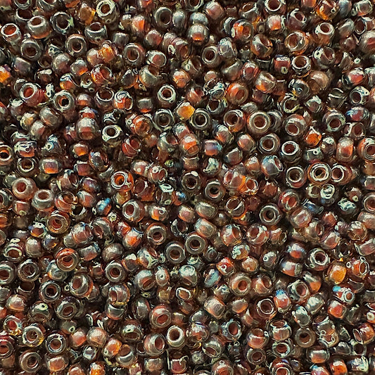Miyuki 11 - 4502 Transparent Dark Topaz Picasso - The Bead Mix