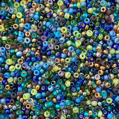 Mix of Miyuki seed beads in shades of green, blue, purple, brown, and gold.