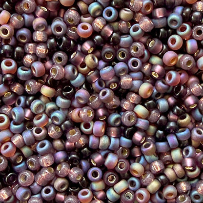 Mix of Miyuki 11/0 round seed beads in shades of plum and mauve with various finishes.