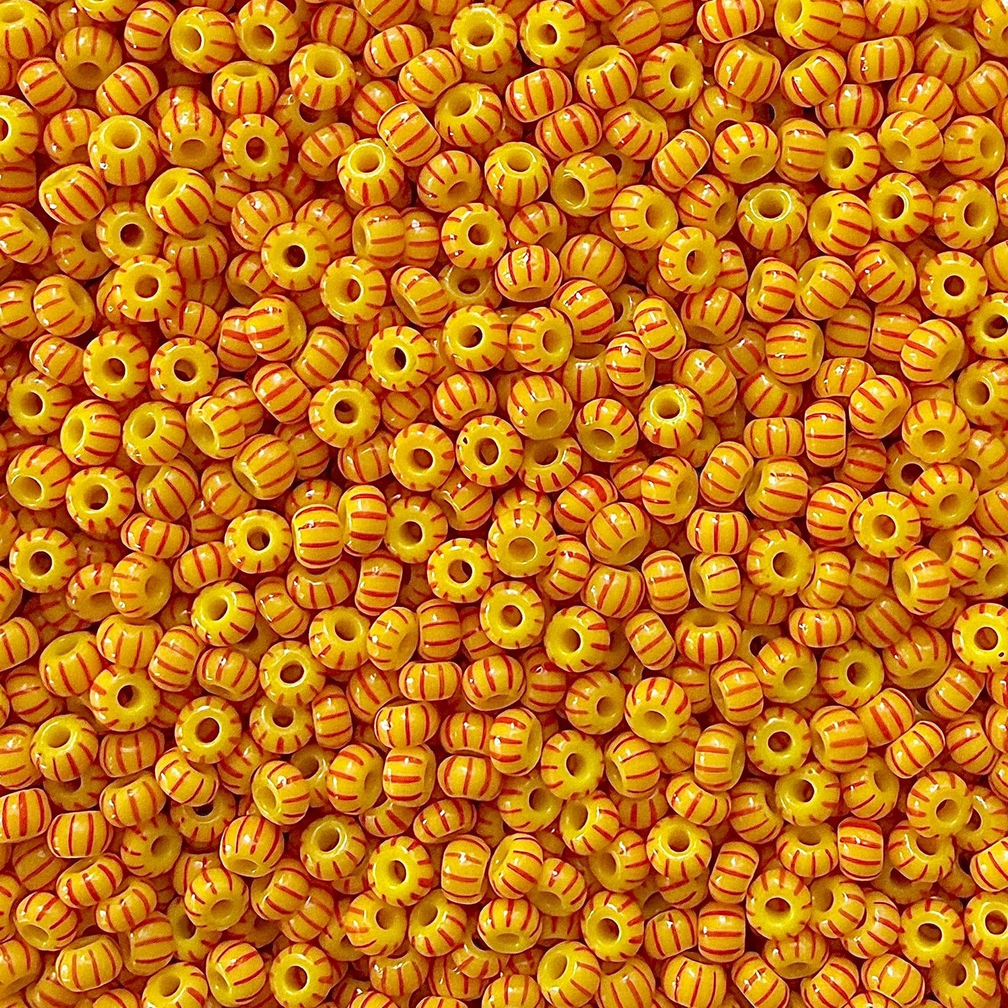 Yellow & Red 6/0 Czech Striped Seed Beads (100g) - The Bead Mix