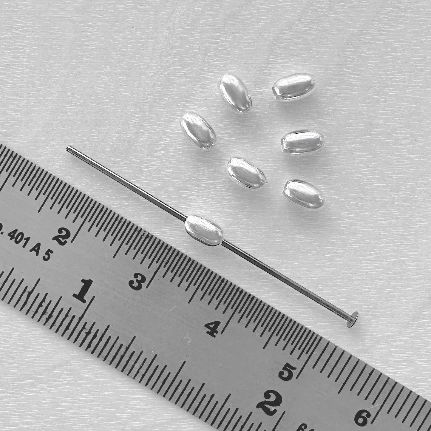 3 x 4mm Sterling Silver Oval Beads - The Bead Mix