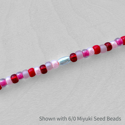 4 x 7mm Sterling Silver Oval Beads - The Bead Mix