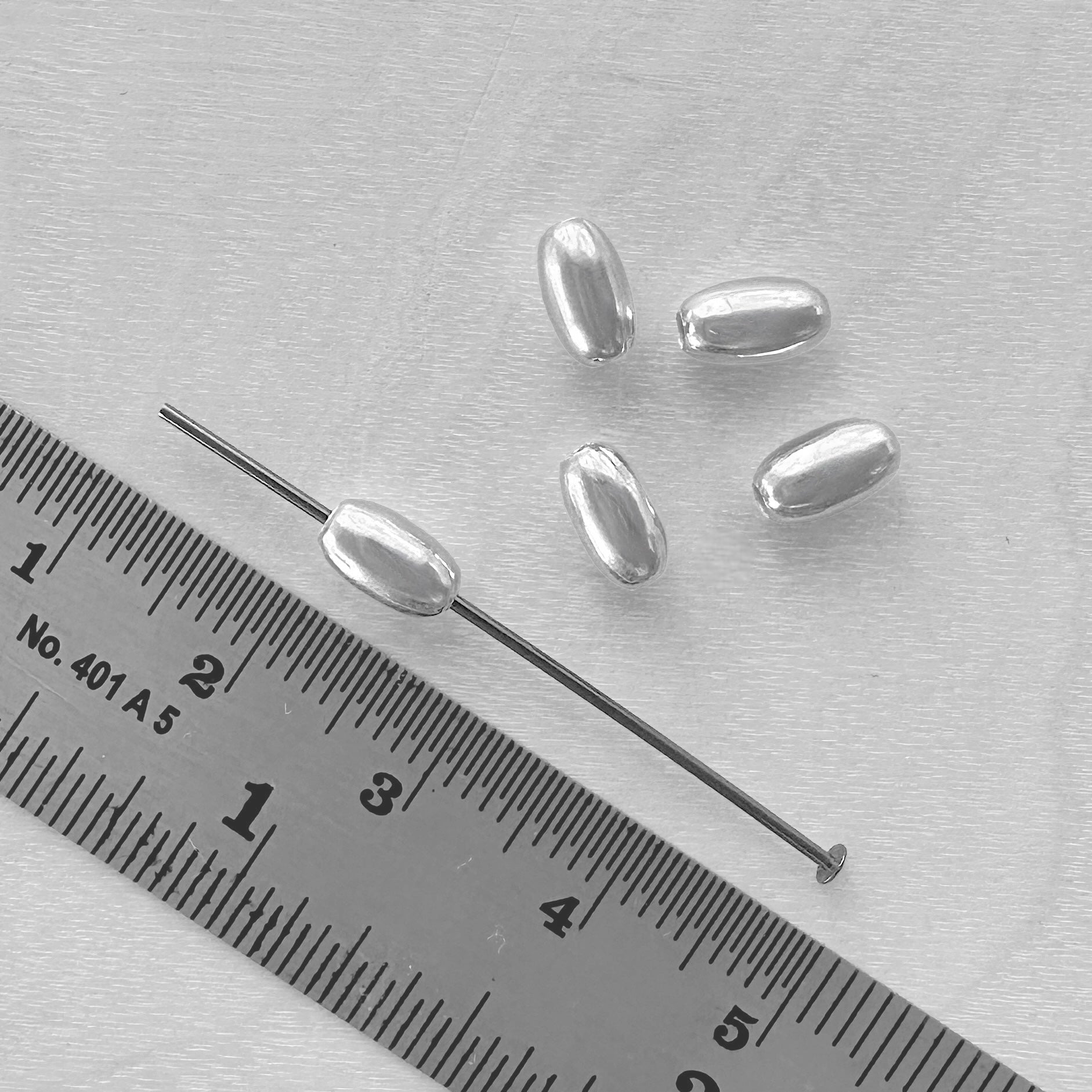 4 x 7mm Sterling Silver Oval Beads - The Bead Mix