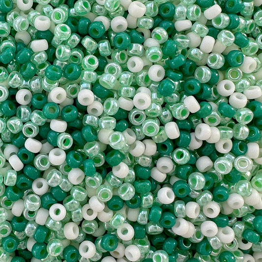 A mix of green and cream Miyuki 11/0 seed beads created by The Bead Mix
