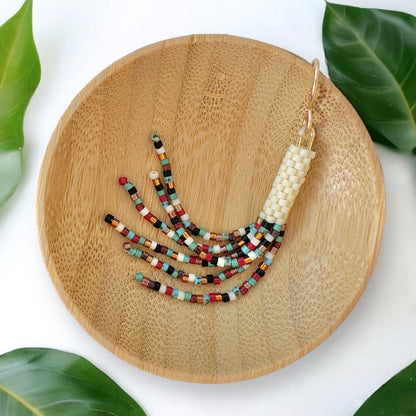 Mix of Miyuki seed beads in shades of turquoise, red, brown, green, and cream with Santa Fe Miyuki Bead Color Palette.